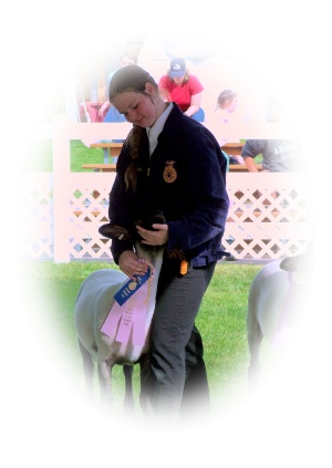 A very proud exhibitor and her lamb, Earl.
